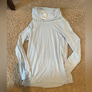 Woman’s small turtleneck top. NWT